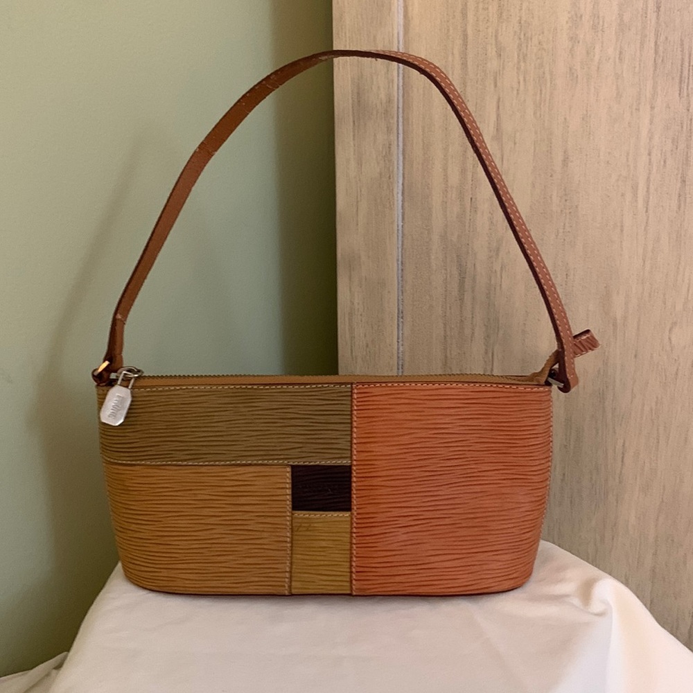 Prune small leather multi-color handbag. Made in Argentina